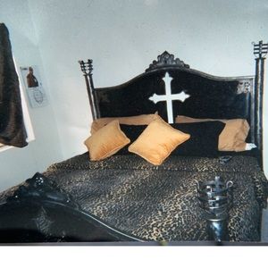 A custom iron bed frame w/candle holder! Quality